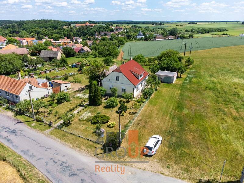 Prodej rodinného domu 4+1 s garáží a hospodářskou budovou, pozemek 1 906 m² – Tavíkovice