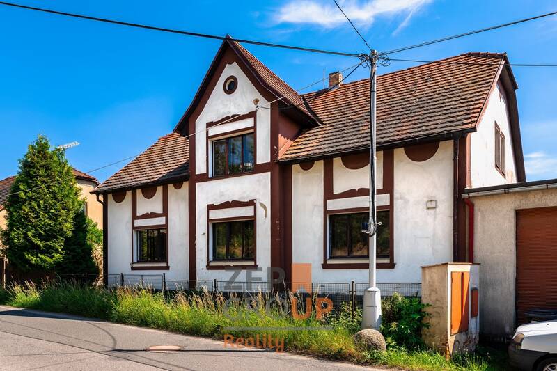 Prodej rodinného domu 4+1 s kompletním podsklepením a pozemkem 1 027 m² v Novém Kníně
